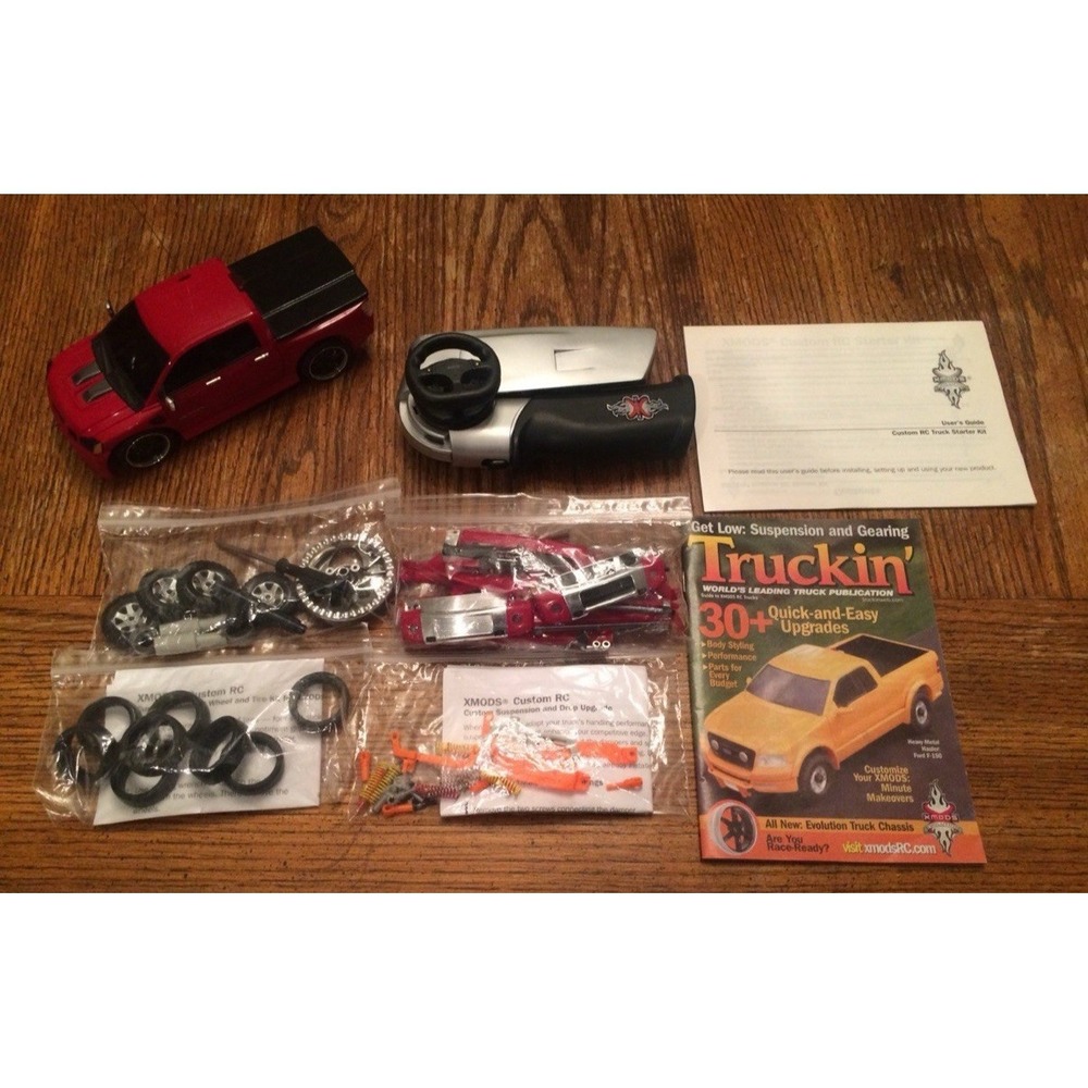XMODS Red Nissan Titan RC Car, Controller, and many extras.